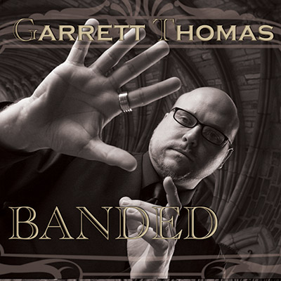 Banded DVD & Accesorio (21 mm) - Garrett Thomas & Kozmomagic